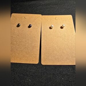 Set of 2 pairs of stud earrings  1 metallic pair and 1 pearl pair. Estate Jewery